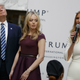 Trump, accompanied by Tiffany and Ivanka, looks up as bells ring during the grand opening of the Trump International Hotel- Old Post Office, Wednesday, Oct. 26, 2016, in Washington.Photo via AP